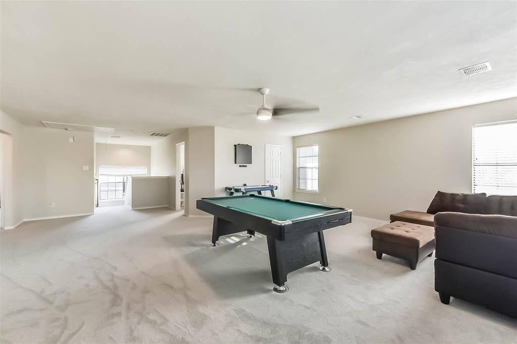 Whether it’s game night or just winding down, this Texas-sized game room upstairs is ready for whatever fun you throw at it!