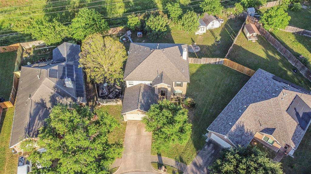 Look at all that space! From this angle, you can really appreciate the size of the lot and the thoughtful layout. Whether you dream of a pool, garden, or just space to run wild—this backyard has room for it all!