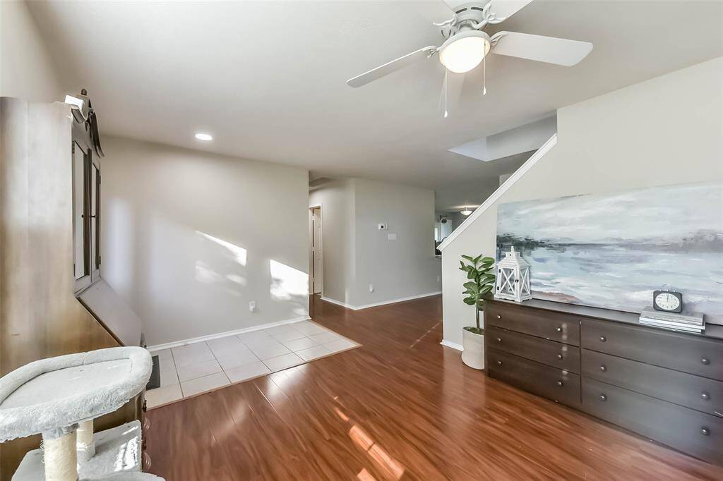 Clean lines, soft tones, and updated flooring make this entry and flex space feel modern and versatile. Whether you're greeting guests or just grabbing the mail, it’s a breath of fresh air every time you walk in.