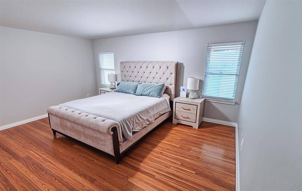 The generously sized second bedroom is perfect for guests, children, or anyone in the household. It offers ample space and a large closet, making it as practical as it is comfortable.