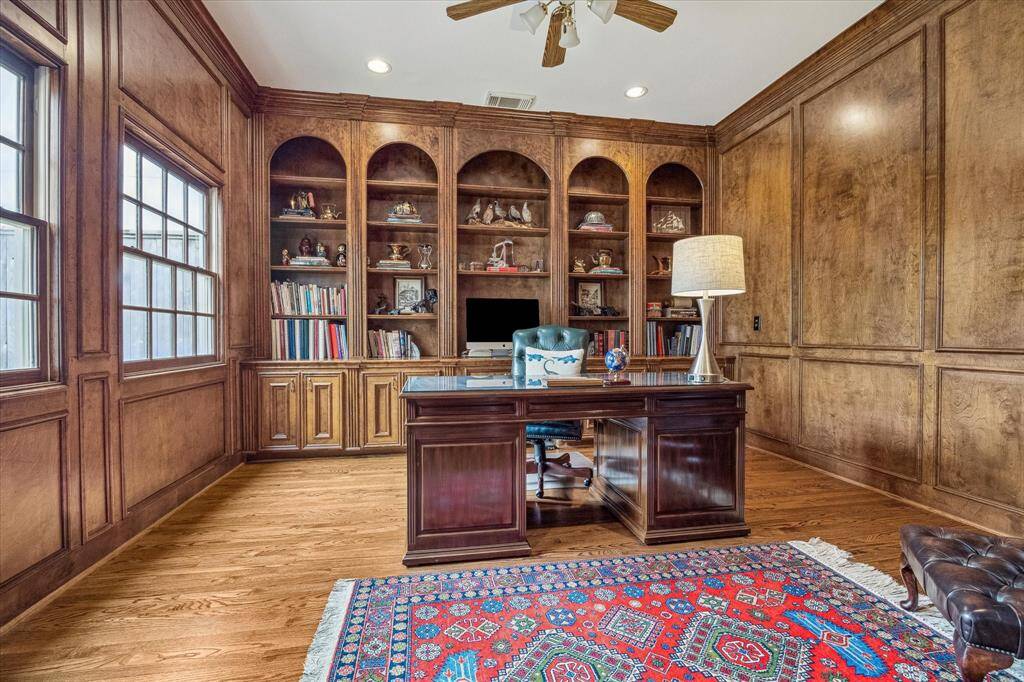 The stately first floor study overlooks the beautiful back garden.  The paneled walls and lovely built-ins create a lovely study.
