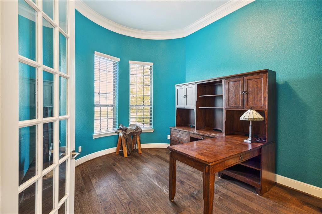 Front Office leads to single car garage and large storage area.