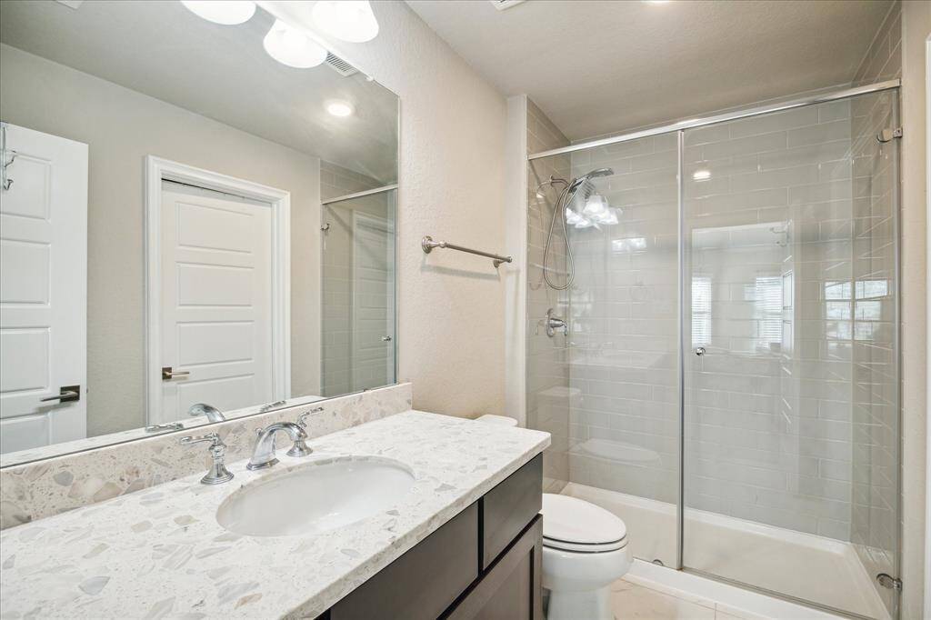 In suite bathroom to the third guest bedroom