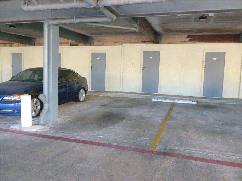 Parking garage on street level offers 2 spaces and a storage closet