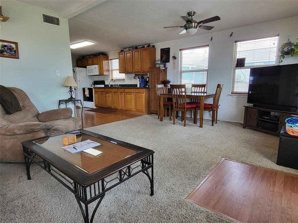 Living room open to kitchen/dining