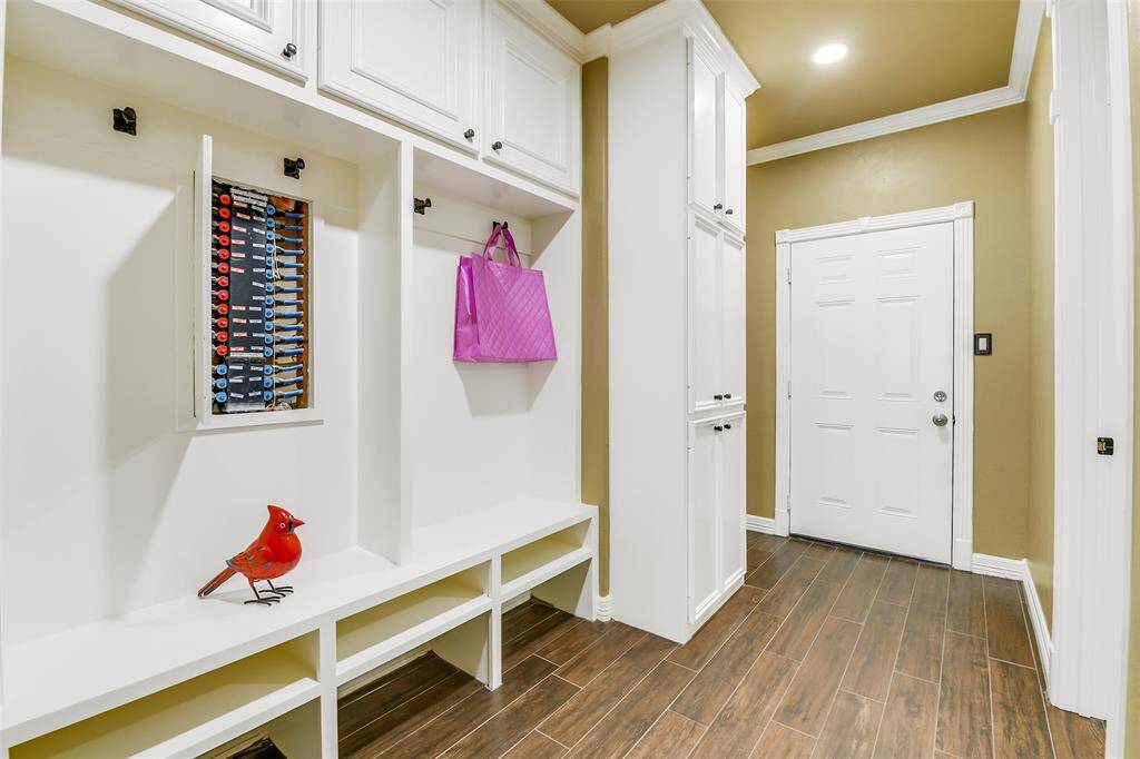 Mud Room is located between the garage and kitchen area.