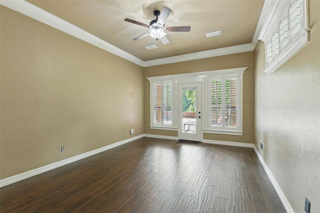 Beautiful primary bedroom with access to the pool.