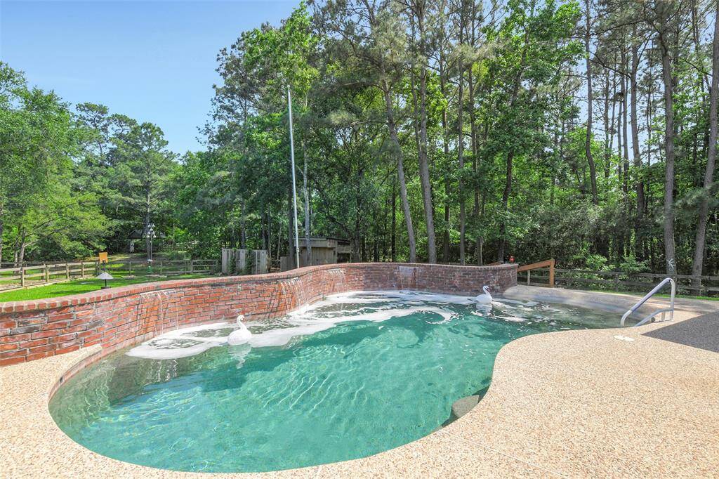 Beach entry pool, with a calming water feature.