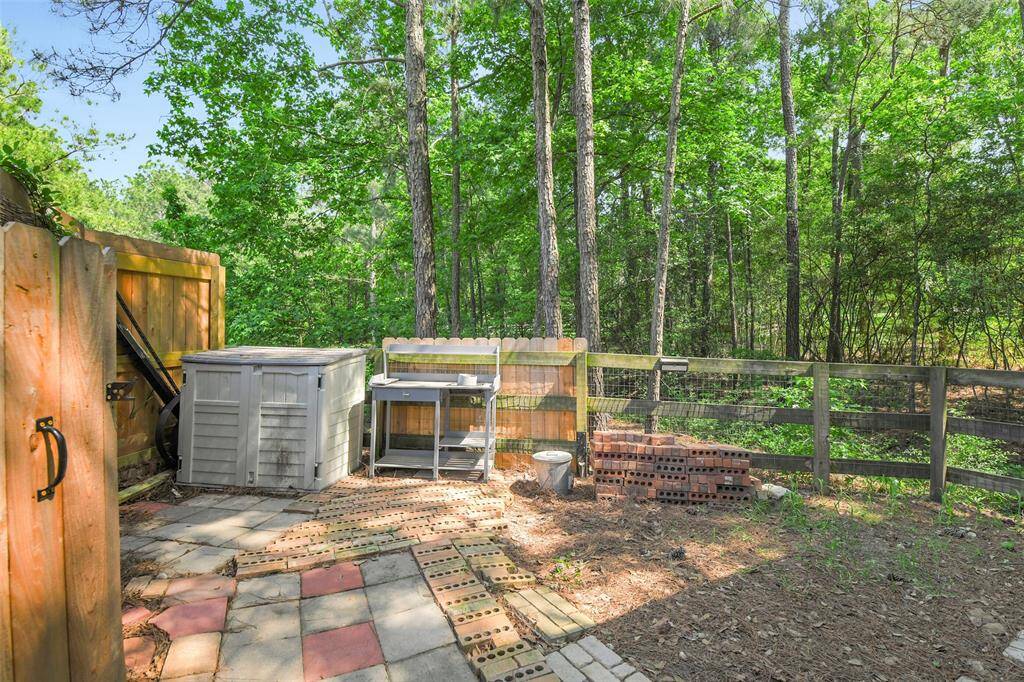 Great area for your gardening and outdoor projects, over looks pond.