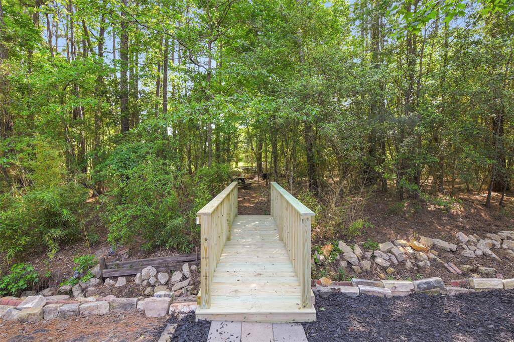 Cute bridge leads you to a very cool secret garden area.