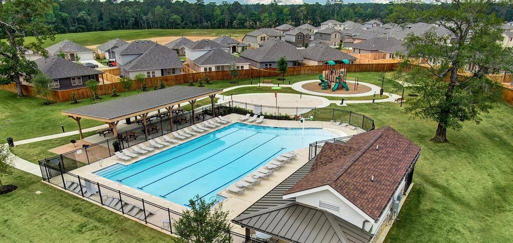 Community Pool, Playground, Splash Pad & Pavilion with restrooms.