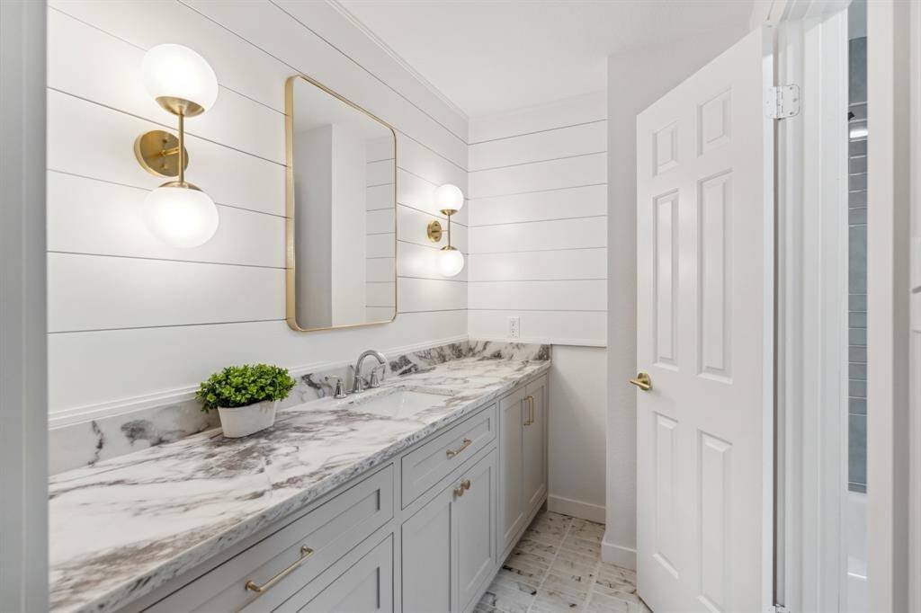 This is the jack-n-jill bathroom that connects two of the upstairs bedrooms. Every room has its own large vanity area.