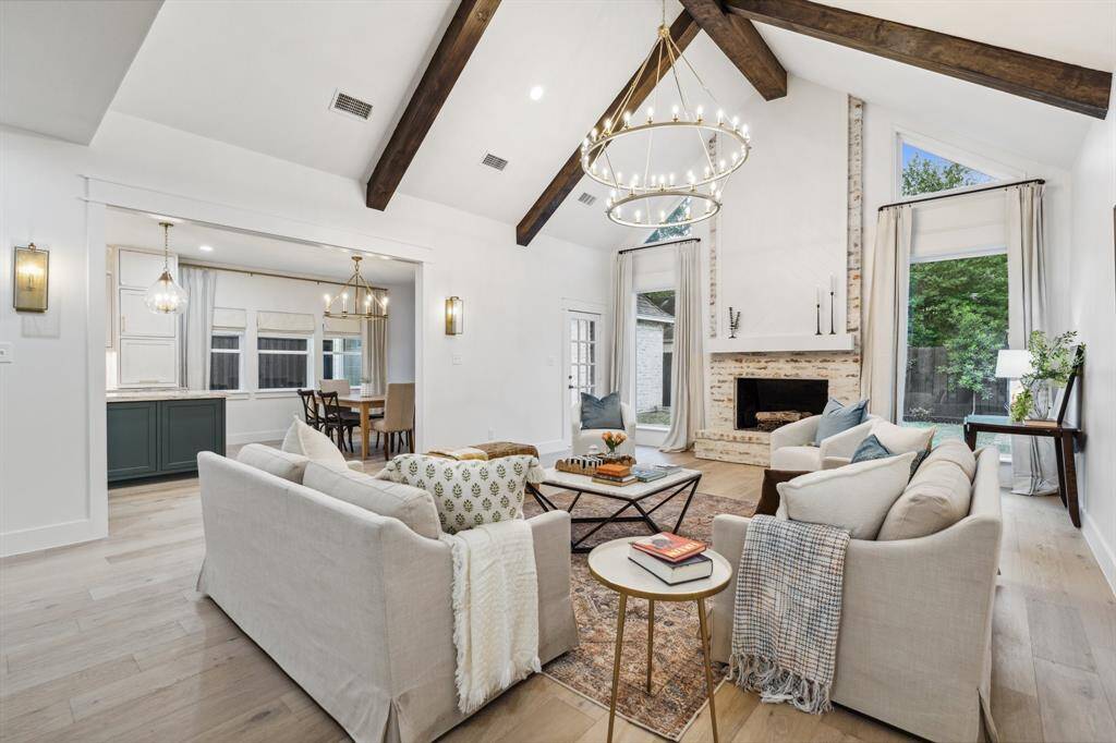 The layout lends to entertaining and provides a natural flow from room to room. Windows throughout this living space allow the natural light to pour in.
