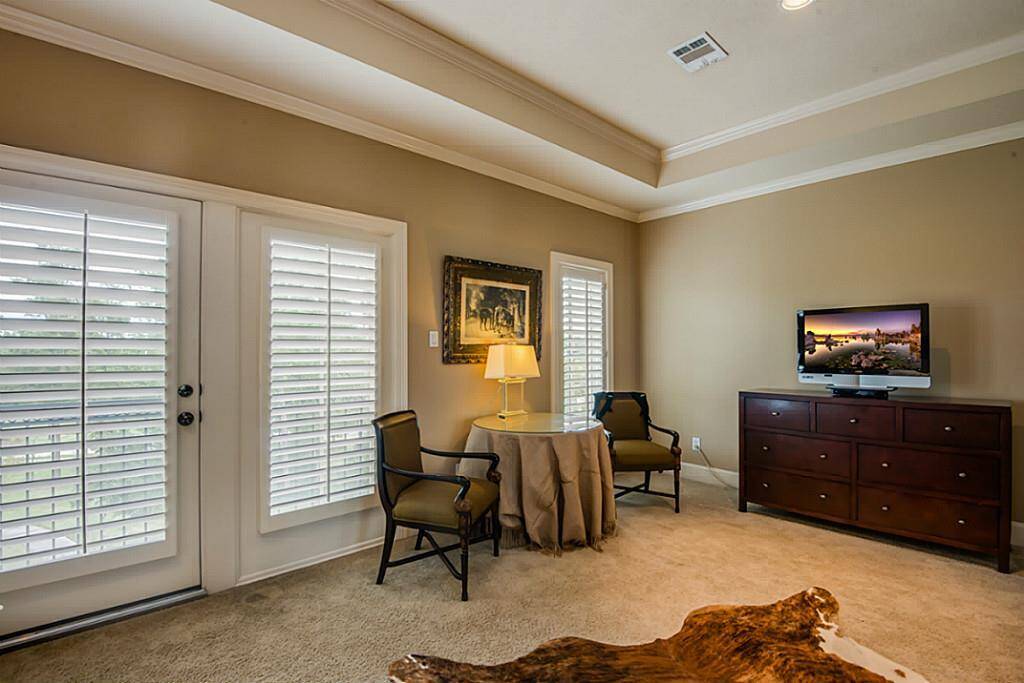 Also on the third level, the opulent master retreat is unmatched! It offers plenty of room for a sitting area, balcony access, crown molding, and much more!