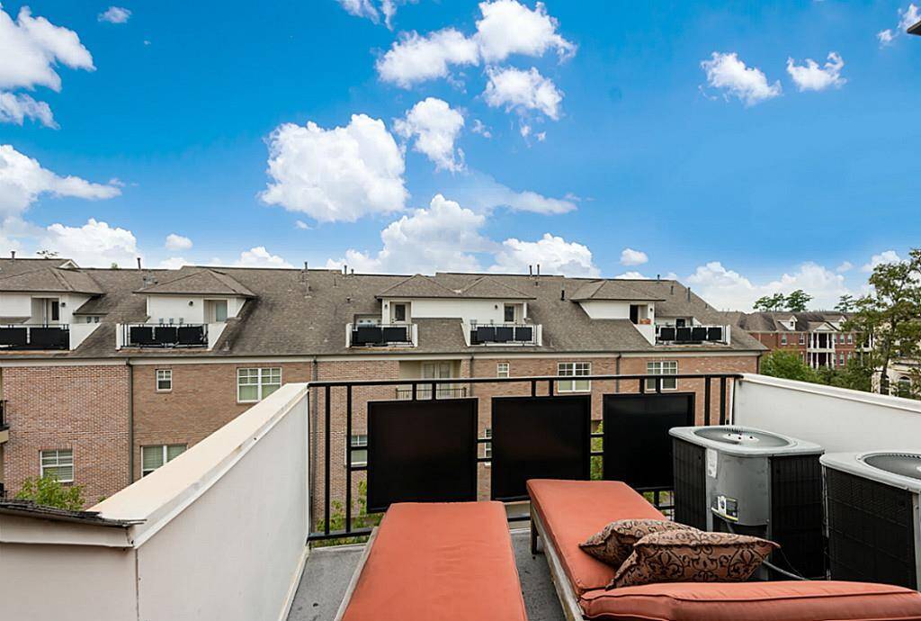 Off of the fourth floor media/game room, this rooftop balcony is another bonus, adding additional outdoor living space!
