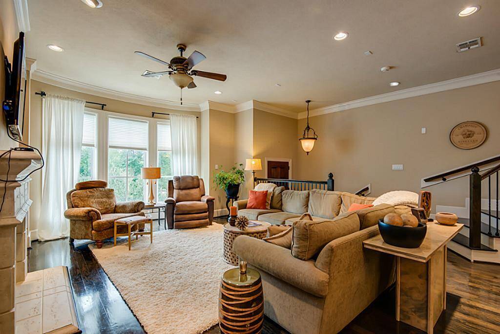 The living room and kitchen are located on a separate floor from both bedrooms, which ensures the bedrooms remain private and quiet!