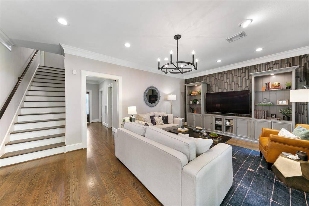 Access to the second floor is located at the back of the living room.