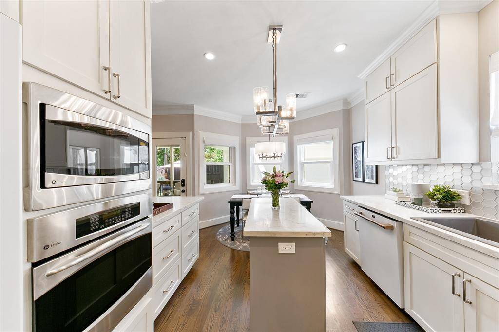 The microwave and oven are built-in to maximize the space of the kitchen.