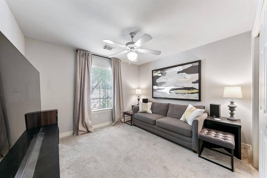 Another one of the upstairs secondary bedrooms.  It is currently being utilized as a media room.
