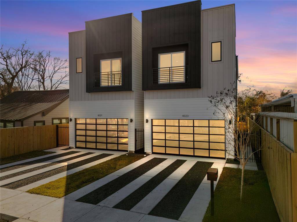 The beautiful modern residence shows a level of sophistication from it's various exterior design elements that create a masterpiece. The frosted panel garage doors add to a stunning curb appeal which carries on to the ribbon driveway with flagstone accents.