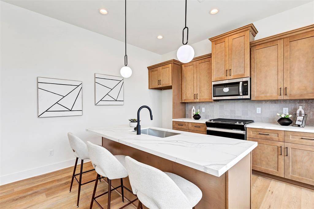 Spacious kitchen cabinets offering ample storage, keeping your kitchen organized and clutter-free.