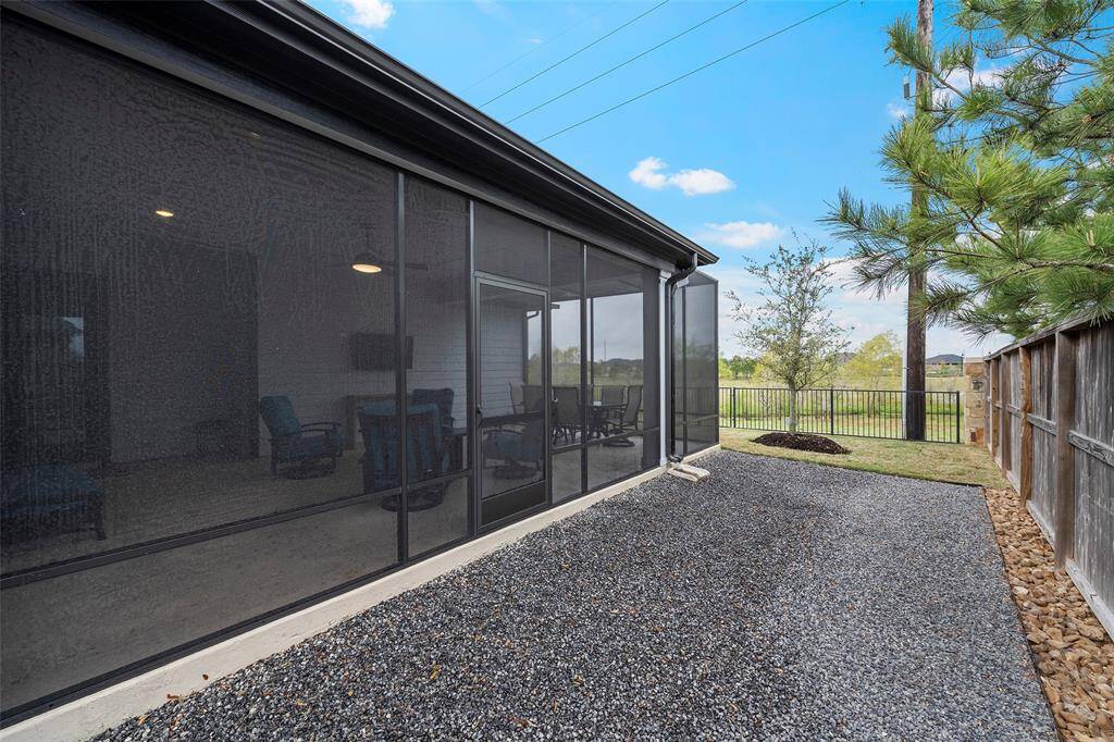 The black star gravel creates a focal point!  Adds some pots will cactus and aloe, and you have your own serene garden!