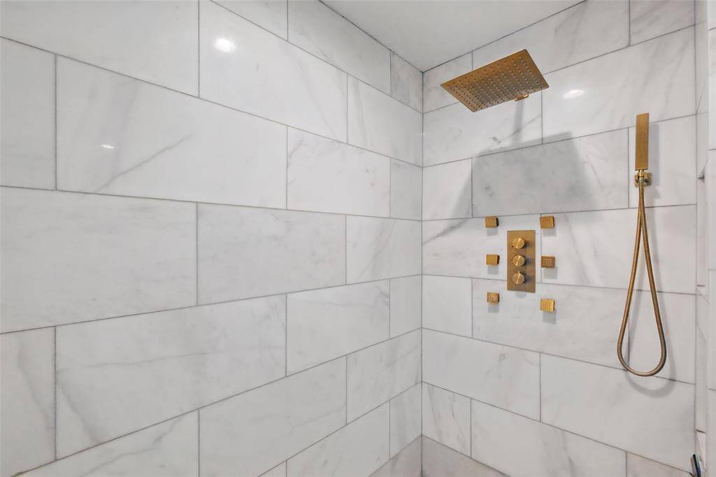 Brass fixture body prayers, rain showerhead and spray wand.
