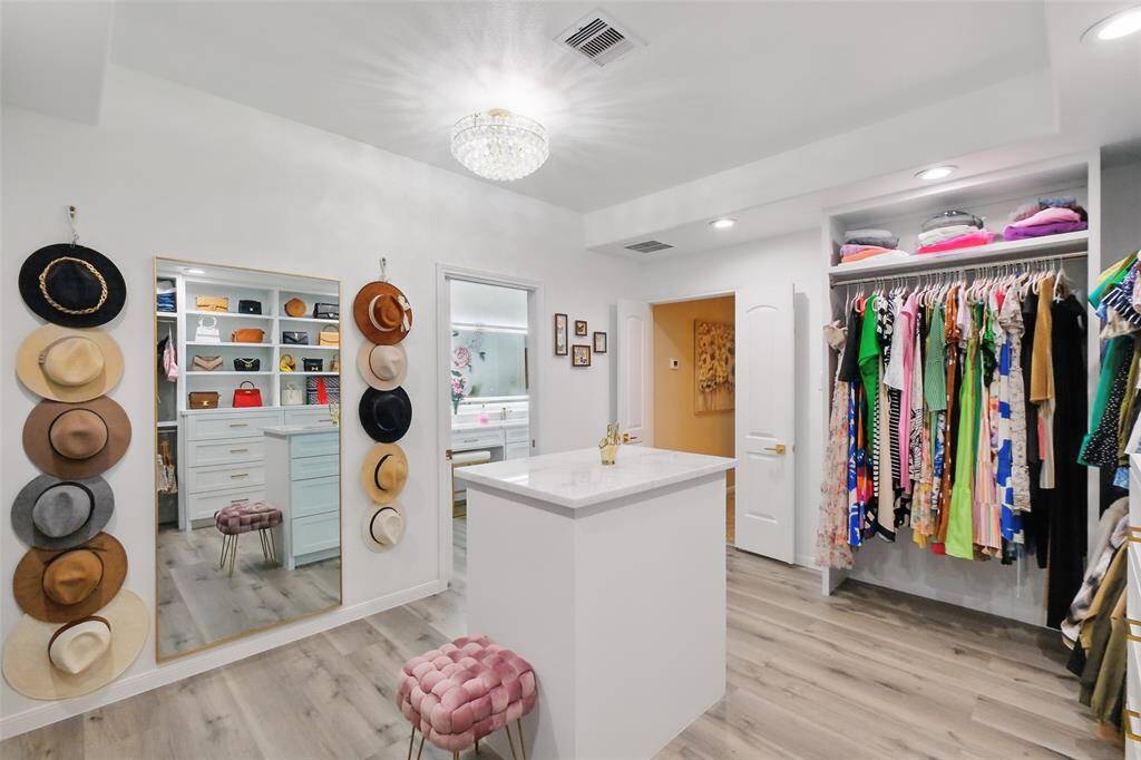 Thoughtfully curated storage, lighting, and dressing area.