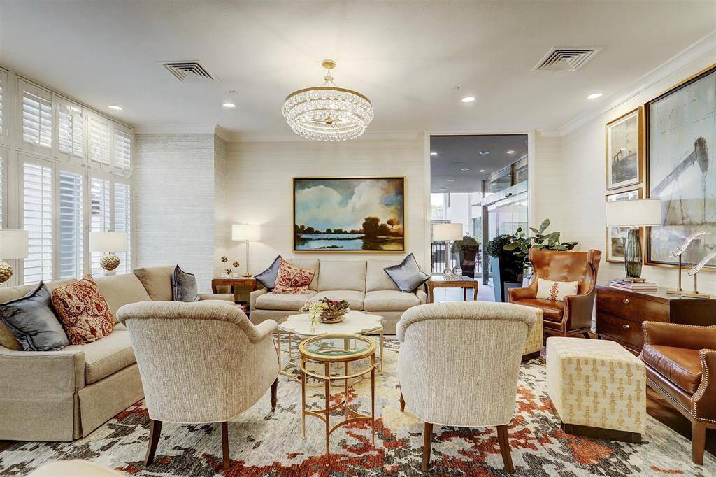 Spacious party room available for resident reservations, featuring a dining area and catering kitchen.