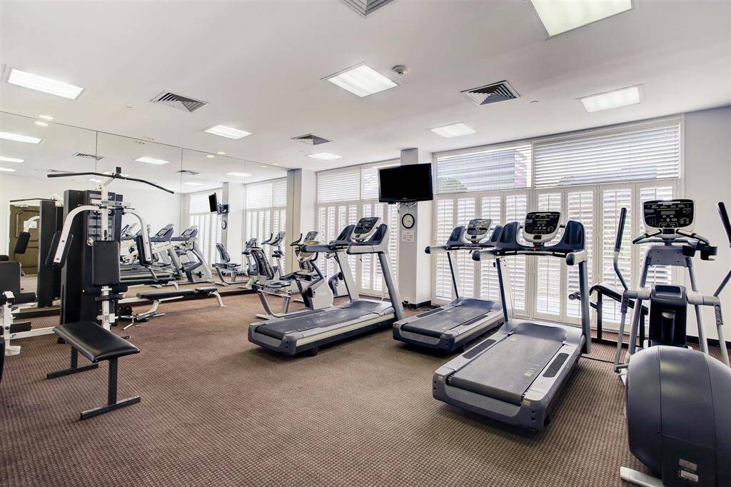 Building has a fitness center - undergoing updates in Jan 2025 with new equipment, LED lighting, and new flooring. Near the fitness center is the dry sauna room with hot tub.