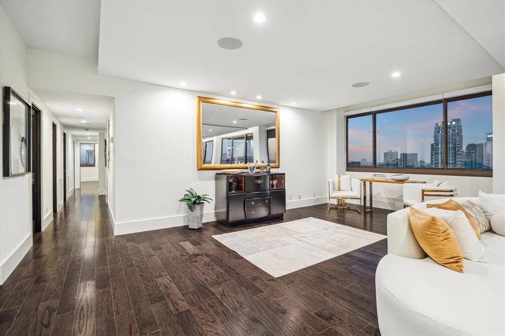 Freshly painted interiors and brand new 5" engineered hardwood flooring throughout.