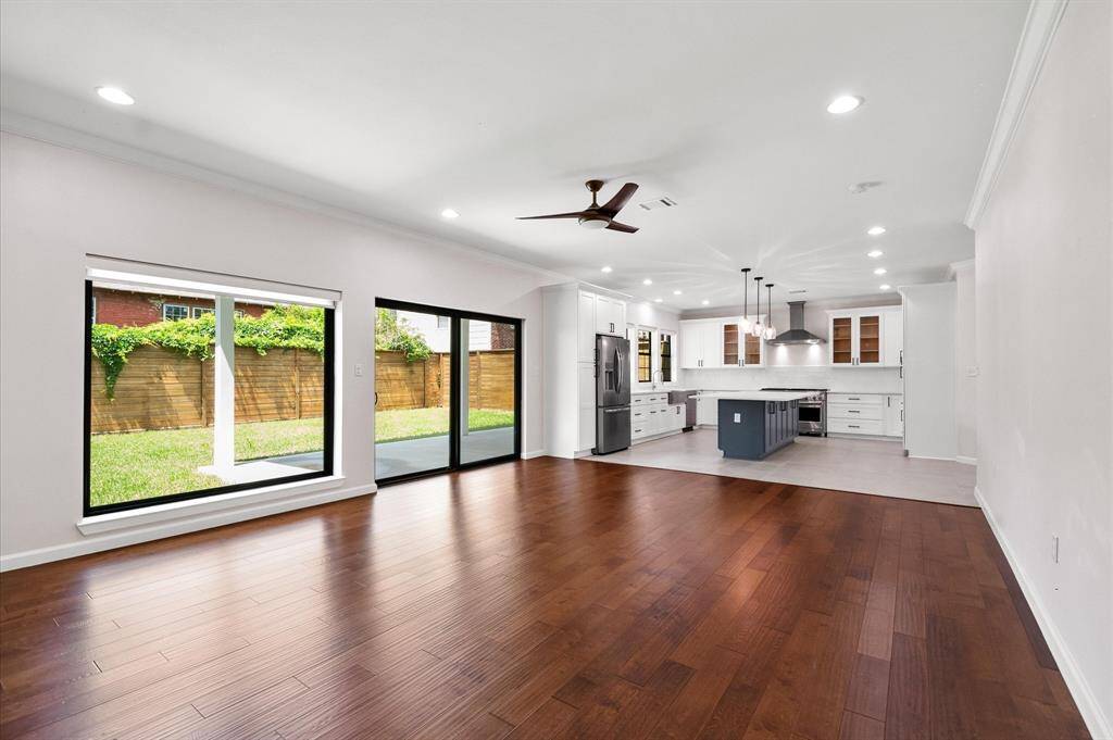 Kitchen opens up nicely to the family room with beautiful natural light, sliding glass doors and access to your covered patio, outdoor kitchen and more.