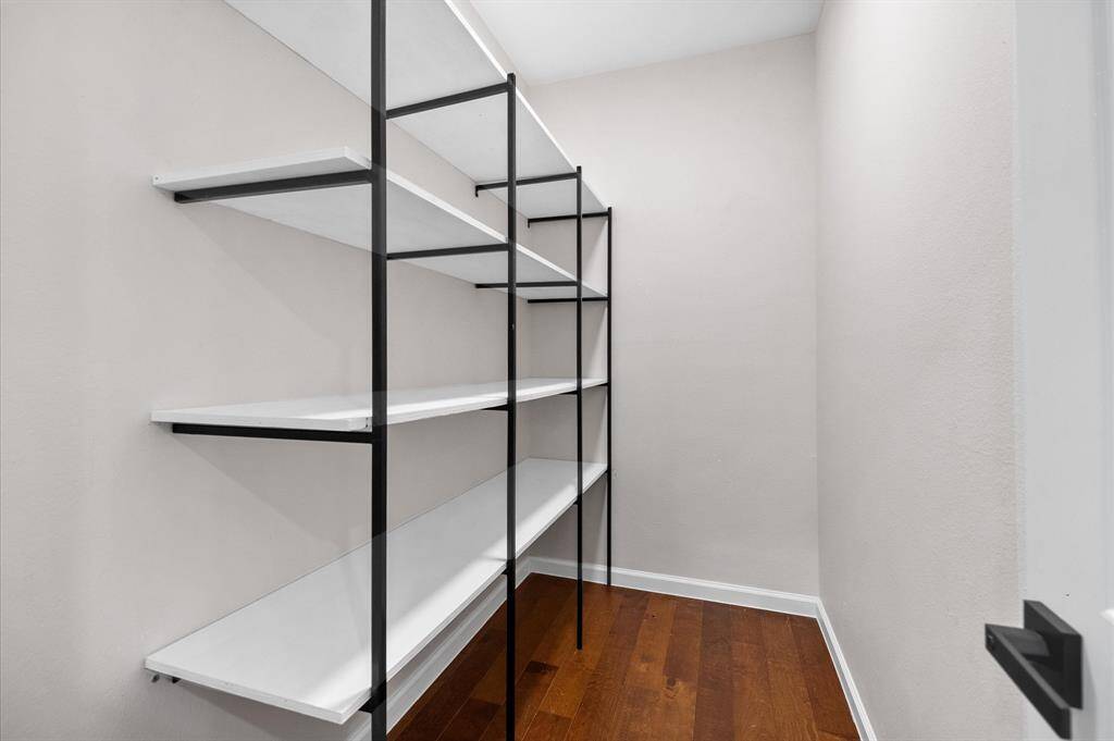 Upstairs storage area off the common area with functional space. Approximately 5x9.