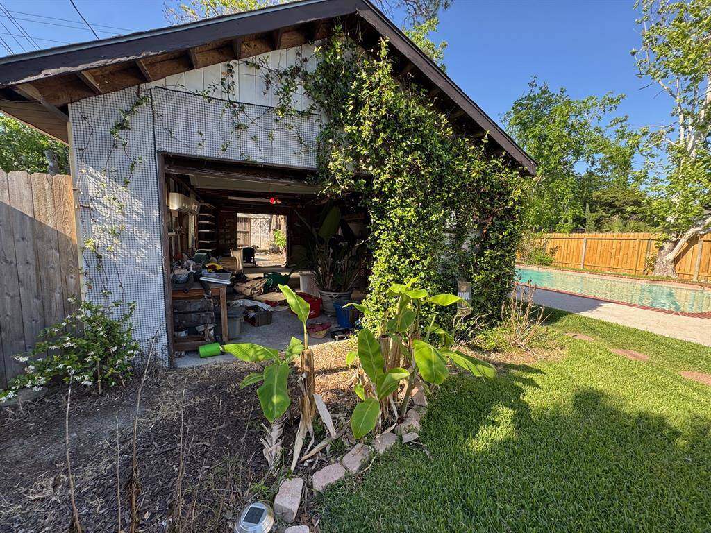 Garage in rear. The alleyway ingress/egress will go away with the sale of this property.  Entry to new garage would be from Beech St.