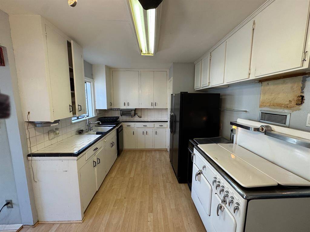 Kitchen with sink on the left