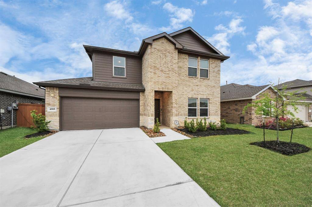 Stunning stone-accented elevation for enhanced curb appeal.