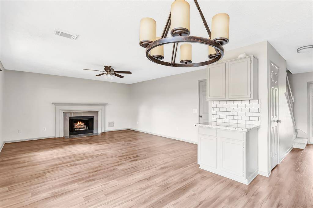 Cozy up to the fireplace and grab a drink from the coffee or wine bar