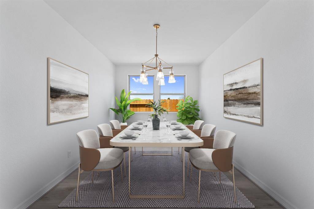 The dining area is a perfect blend of style and functionality, providing an inviting space for memorable meals and gatherings.