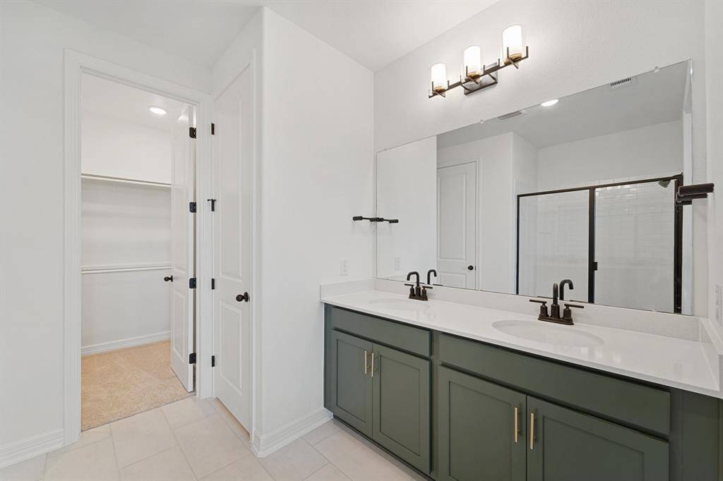 A view of your large primary walk-in Closet