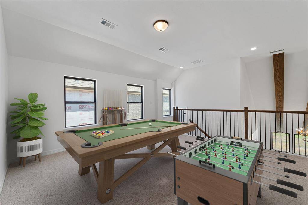 As you make your way upstairs this exceptional game room is a standout feature in this remarkable property, offering a space that combines luxury and fun for all ages.