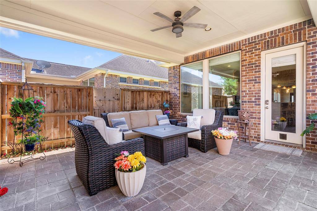 This paved patio not only connects the garage and the home, but it also provides a great space to enjoy the outdoors!