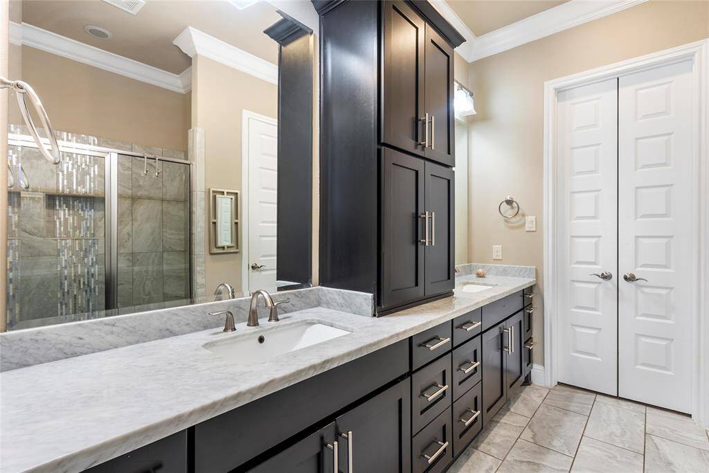 Why go to the spa when you have this bathroom at home! Sophisticated granite counters compliment an abundance of cabinets!