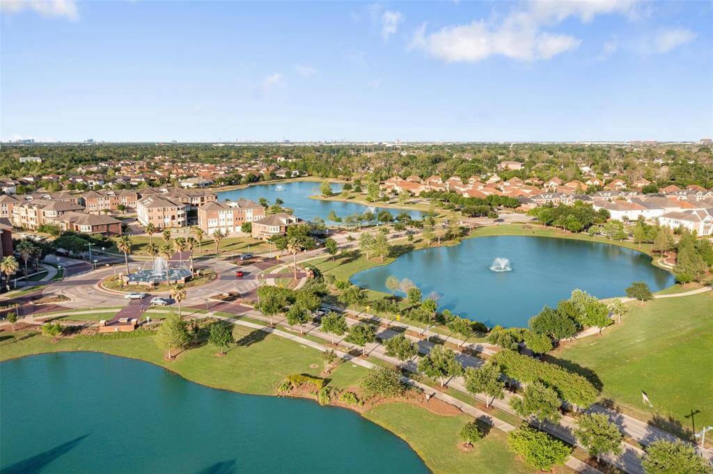 This community has multiple walking trails offering lake views as you stroll through treelined streets!