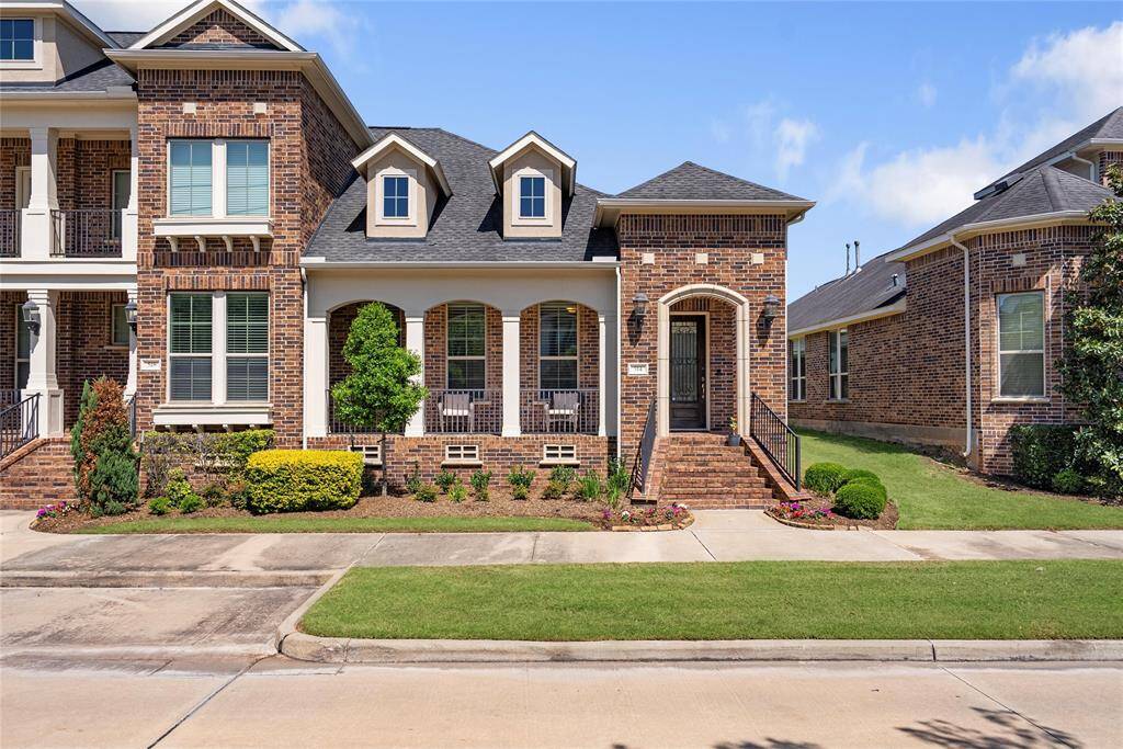 This corner unit has a charming brick exterior! Front yard landscaping is included in the HOA