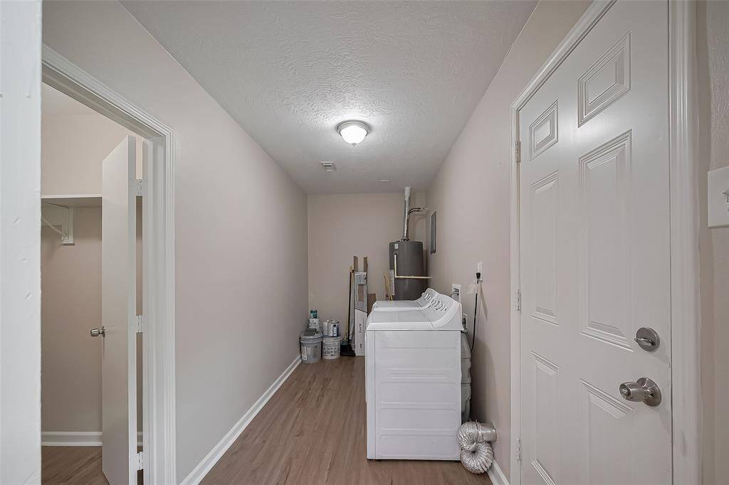 This oversized utility space is complete with an included washer and dryer, with ample room that makes laundry day a breeze.