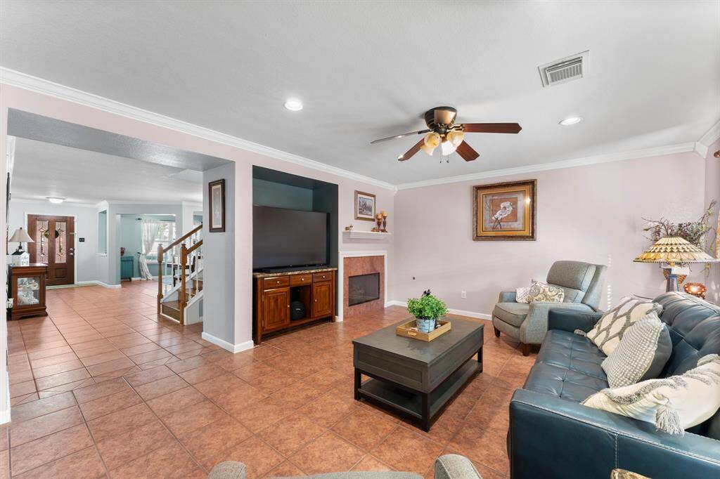 Take in the expansive view from the family room, seamlessly connecting to adjoining spaces and highlighting the open floor plan.