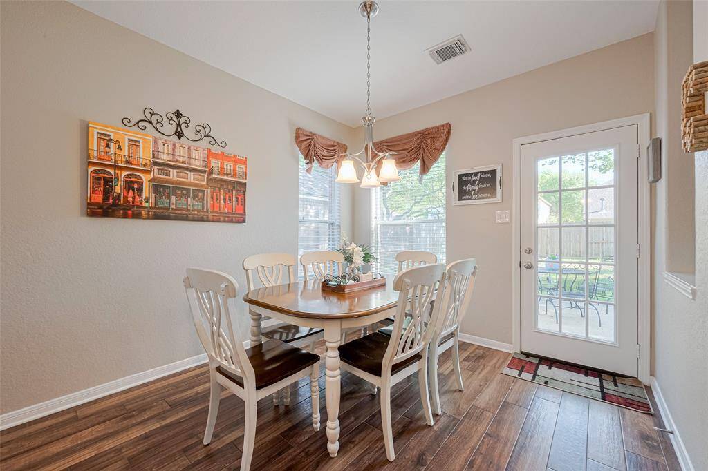 Enjoy a light-filled breakfast room - perfect spot for laid-back dining with family and friends