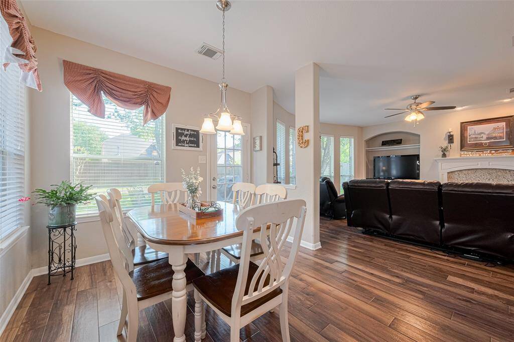 From this angle, you can truly appreciate the open layout connecting the kitchen, breakfast room, and family room