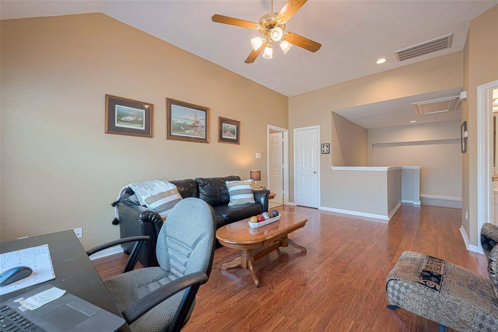 Upstairs features a versatile space that can serve as a game room, second family room, or cozy sitting area—designed to adapt to your lifestyle