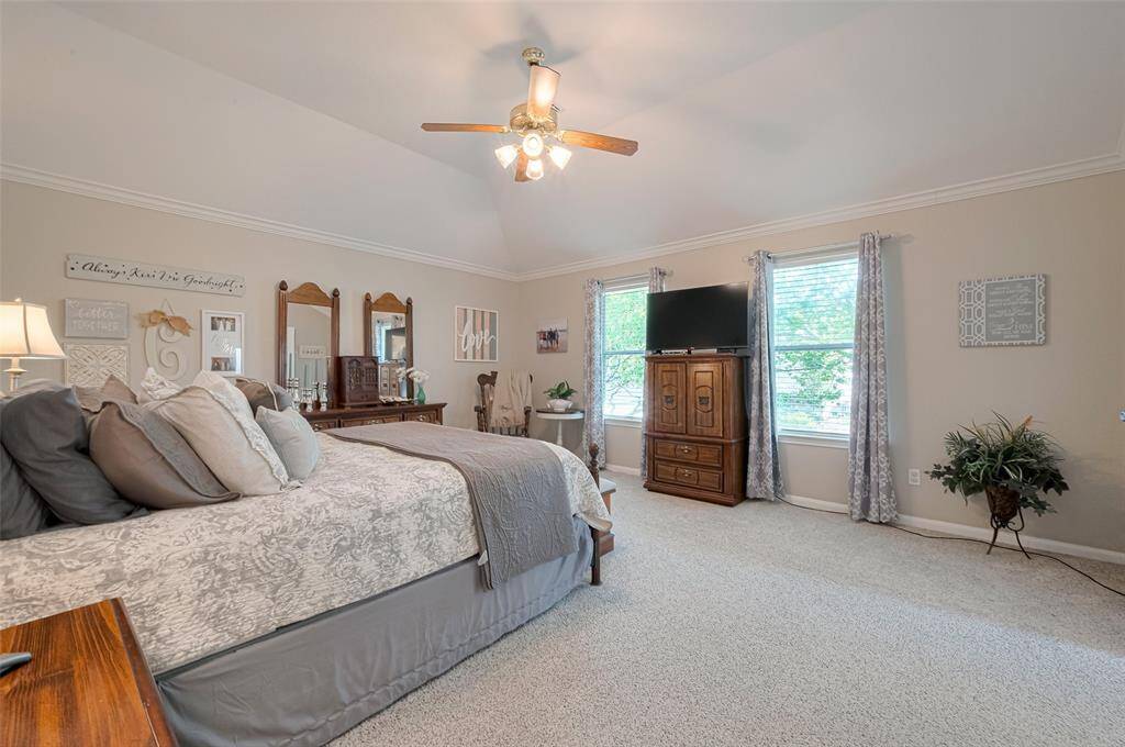 This oversized 18'x14' primary bedroom is a true retreat, with room to spare for a cozy sitting area, nursery, or whatever fits your lifestyle—photos simply can’t capture its scale!